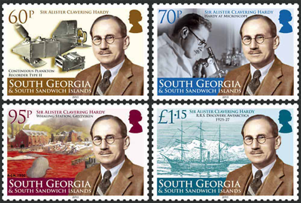 Four postal stamps from South Georgia and South Sandwich Islands showing portrait of Alister Hardy with vignettes of scientific work